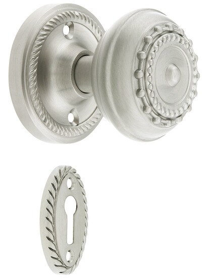 Rope Rosette Style Mortise Lock Set With Meadows Door Knobs in Satin Nickel finish.